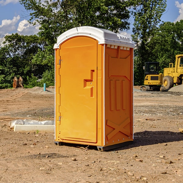 how often are the portable restrooms cleaned and serviced during a rental period in Osterdock Iowa